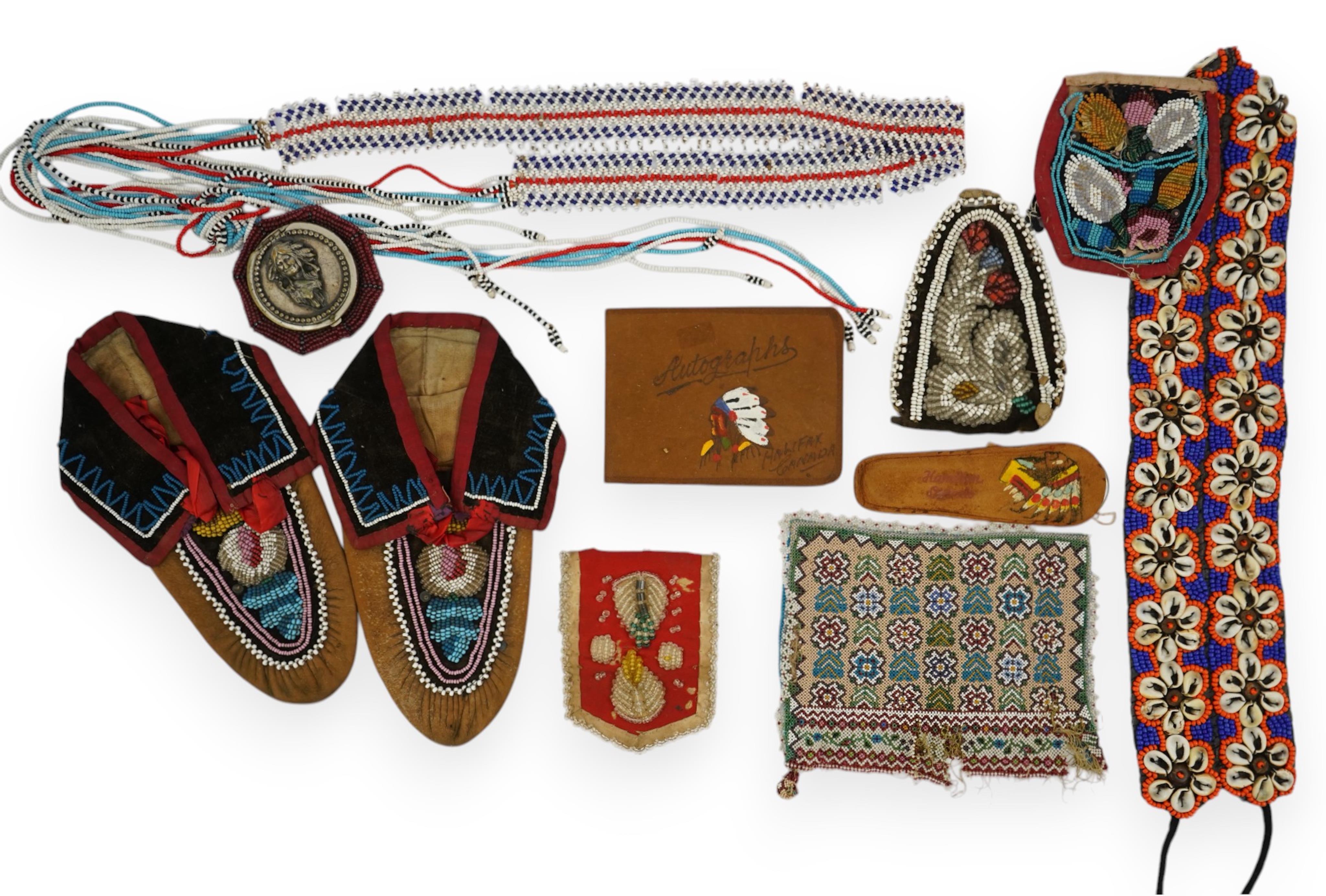 A collection of mixed decorative bead work, including five items of Native American beadwork, together with an early beadwork bag and later beaded items. Condition - moccasins, bead panel, circular bed purse with metal l